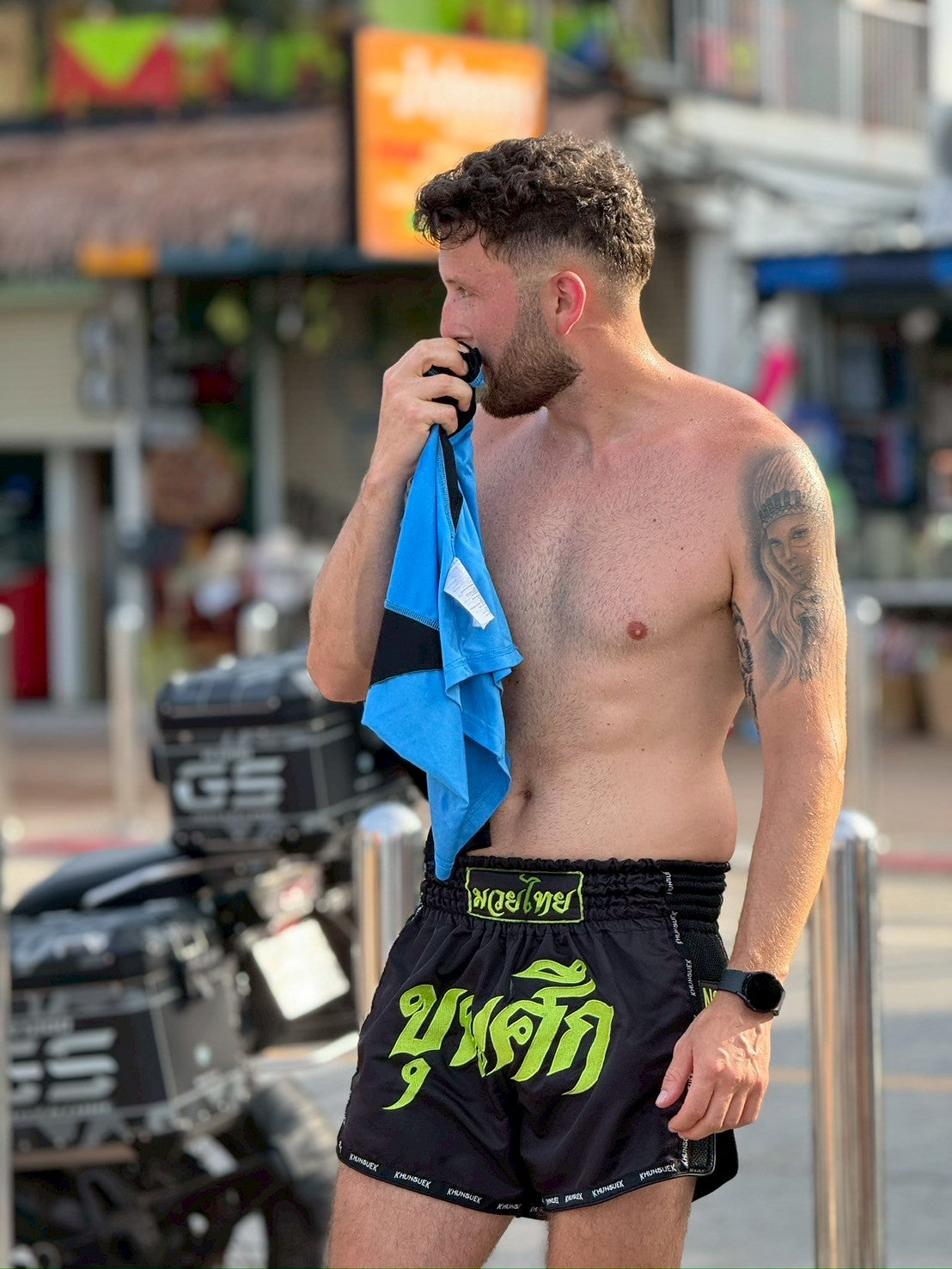 Thai Script Muay Thai Shorts | Black/Neon Green