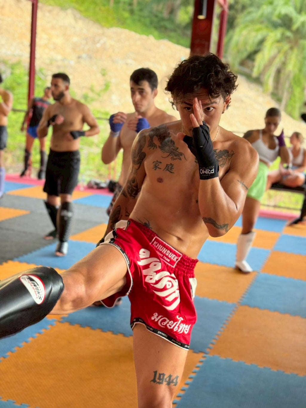 Thai Script Muay Thai Shorts | Red/White